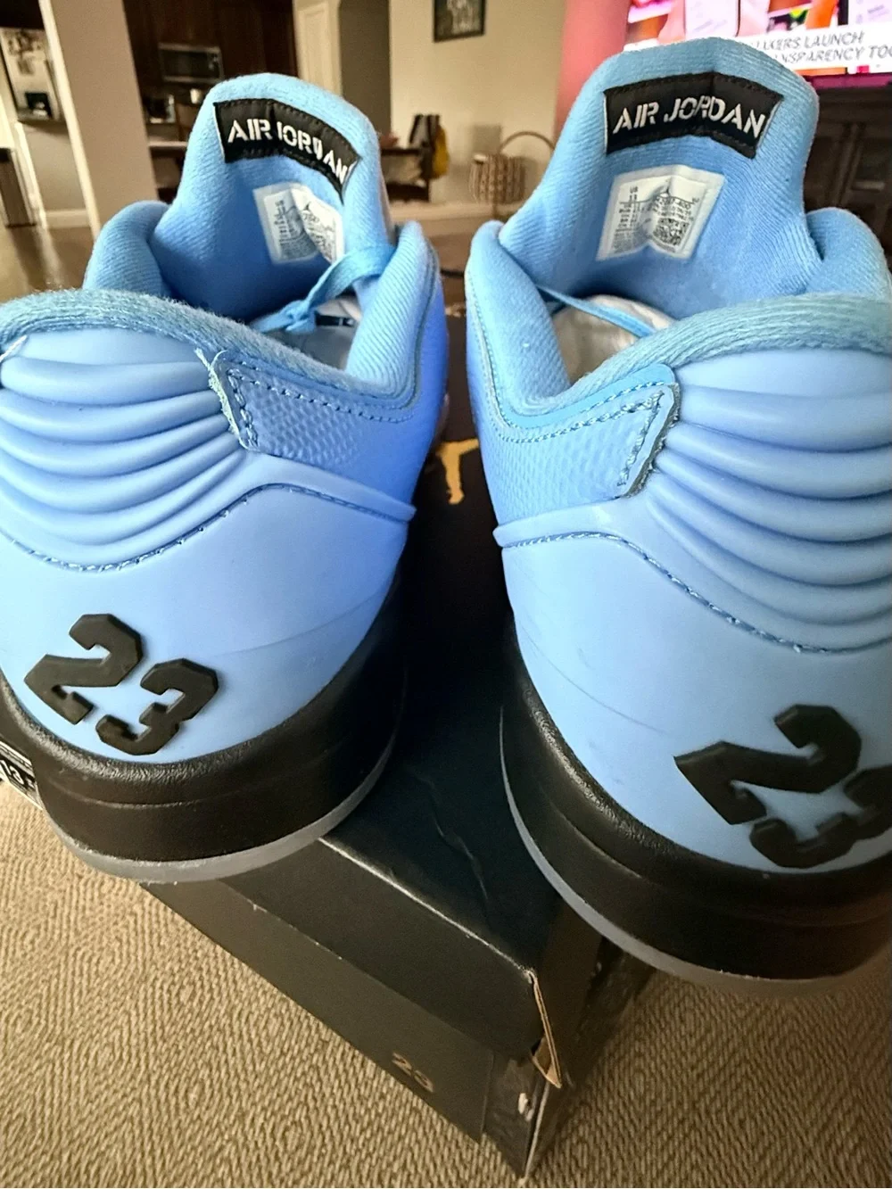 Jordan Men’s Retro Low-Top Sneakers in UNC University Light Blue and Black